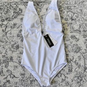 Size small white one piece bathing suit